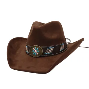 Brown suede wide brim cowboy hat with ethnic bead band and floral buckle detail closeup