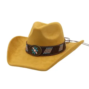 Detail view of a soft suede cowboy hat with ethnic hatband and metal buckle for fashion.