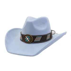 Detailed shot of light blue suede western cowboy hat with floral buckle and beaded band.