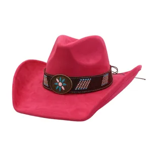 Close-up of pink suede western cowboy hat with decorative vintage concho band and beads.