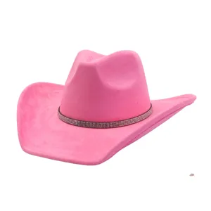 Close-up of the vibrant pink suede cowboy hat featuring a sparkling rhinestone band detail.