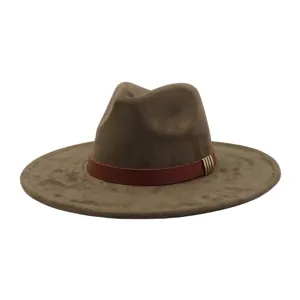 Detail view of the brown suede fedora hat, highlighting the faux leather band and metal buckle.