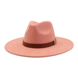Pink faux suede wide brim fedora hat with brown leather band and chic metal loop detail.