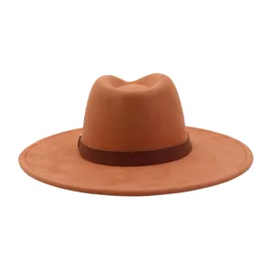 Detailed view of a stylish camel suede fedora hat with dark brown leather band for elegant looks.