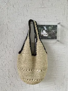 Sac épaule en paille tissée à bord noir, sac fourre-tout d'été décontracté pour la plage.