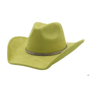 Detailed closeup of the green faux suede cowboy hat showing the sparkling rhinestone band.