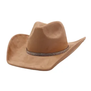 Close-up detail of the brown suede cowboy hat featuring sparkling rhinestone band decoration.