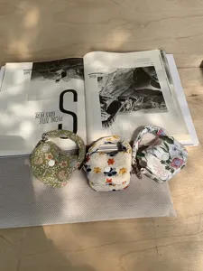 Mini embroidered floral earphone pouch portable coin purse cute handbag miniature style.