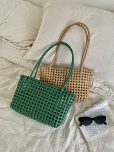 Summer hollow straw beach bag, casual woven tote bag for daily commute and seaside vacation.