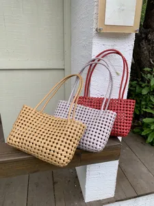 Woven beach tote bag, hollow out design, casual summer shoulder bag for daily commute and vacation.