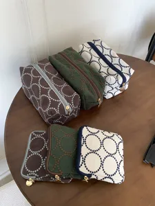 Vintage embroidered fabric cosmetic bag and coin purse, chic student makeup brush storage pouch.