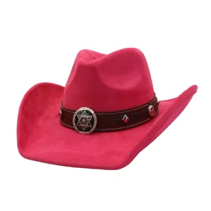 Detail shot of a pink suede cowboy hat featuring a brown leather band and metal concho accent.
