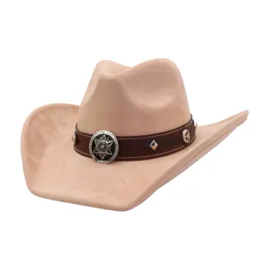 Detail shot of beige suede cowboy hat, showing brown leather band and metal concho decoration.