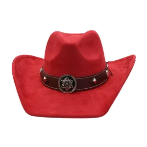 Red suede cowboy hat close-up, featuring brown leather band, metal studs, and vintage star medallion.