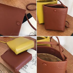 Elegante PU Leder Umhängetasche für Damen, schicke Eimerform mit verstellbarem Schultergurt.