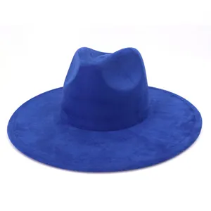 Close-up view of the royal blue suede fedora hat showing its wide brim and fine texture.