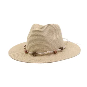 Summer straw fedora sun hat with shell and bead braided decor, casual beach hat detail.