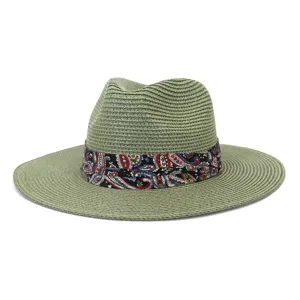 Green fedora straw hat with colorful paisley ribbon for summer outdoor beach sun protection.