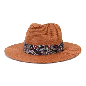 Classic brown straw fedora hat for men and women, featuring a vibrant paisley print ribbon band.