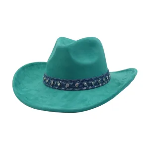 Turquoise suede cowboy hat with sparkling rhinestone band, retro rolled brim detail for outdoor.