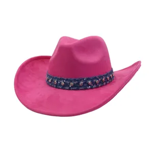 Pink suede cowboy hat detail, rhinestone denim band, vintage rolled brim Western cap.