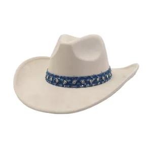 Detailed close-up view of the beige suede cowboy hat featuring a blue denim rhinestone band.