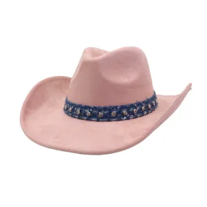Pink suede cowboy hat detail, western style fashion headwear with rhinestone denim band.