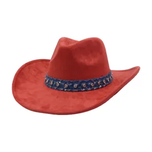 Red suede cowboy hat detail shot, vintage rolled brim with rhinestone denim band.