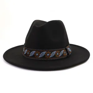 Detailed view of black wool fedora hat with ethnic embroidered band, flat brim style.