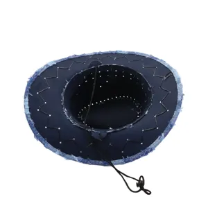 Detailed view of the dark blue denim cowboy hat with raw edges and adjustable cord.