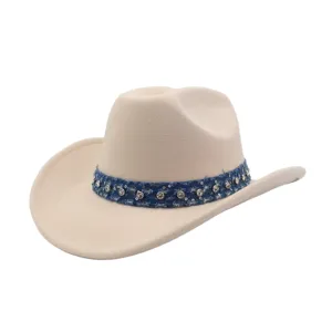 Close-up detail of the elegant beige felt cowboy hat with sparkling rhinestone denim band.