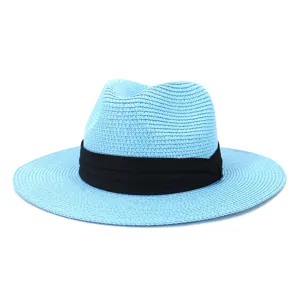 Detail shot of light blue straw fedora hat with black band, summer sun protection beach hat.