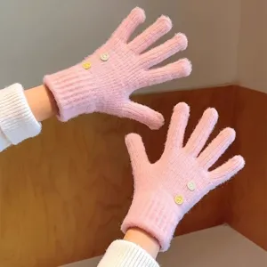 Cute pink knit winter gloves for women warm thick touchscreen gloves with smiley face decor.