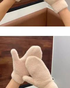 Cozy plush winter mittens detail view, soft fluffy fabric texture for warm daily cold weather wear.