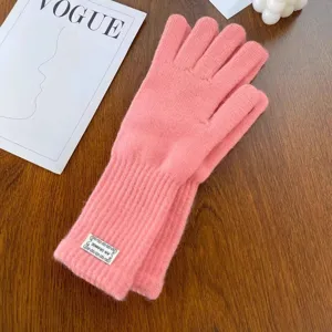 Pink knit winter gloves for women, warm touchscreen thermal mittens with cute brand patch.