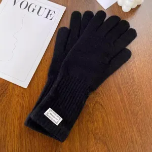 Winter knit gloves for women, warm and windproof, stylish touch screen black gloves.