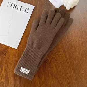 Winter warm brown knitted gloves for women, full finger cozy thermal touchscreen gloves.