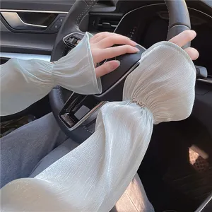 Detailed close-up view of ice silk sun protection sleeves worn while driving, breathable.