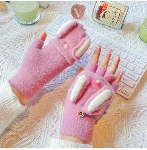 Cute pink rabbit ear half-finger fleece gloves for women winter warmth and style.