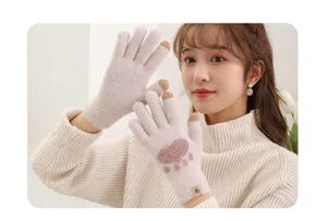 Detailed view of women knit touch screen gloves featuring cute cat paw design and plush lining.