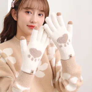 Cute winter touch screen knit gloves for women with warm plush cat paw design and thick soft lining.