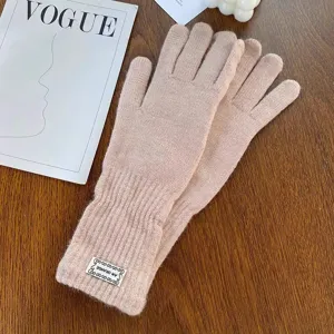Cozy winter knit gloves in soft pink warm woolen material for daily cold weather wear.