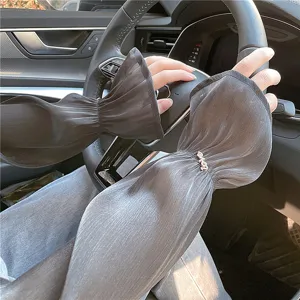 Detailed view of women summer sun protection ice silk sleeves, breathable driving arm cover.