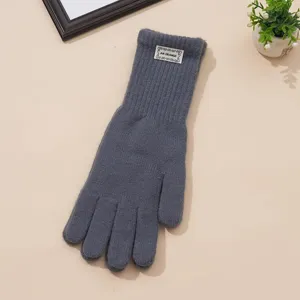 Winter knitted wool gloves for women, warm windproof touch screen dark grey knit mittens.