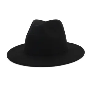 Detail view of the classic black felt fedora hat, showing smooth texture and wide flat brim.