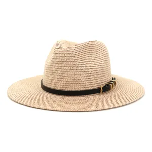 Detailed close-up view of women straw fedora hat featuring black leather belt and metal buckle.