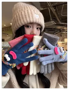 Cute funny quirky knit gloves for women, colorful cute monster design with googly eyes and lips.