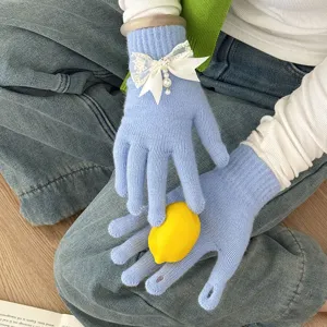 Cute winter warm knitted touch screen gloves for women with lace bow and plush wool fleece lining.