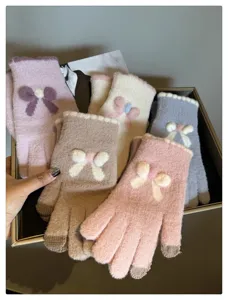 Cute bow knitted touchscreen gloves for women, warm winter five-finger woolen gloves details.