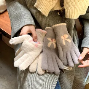 Women touch screen knit gloves autumn winter warm cute five finger gloves with bow design.